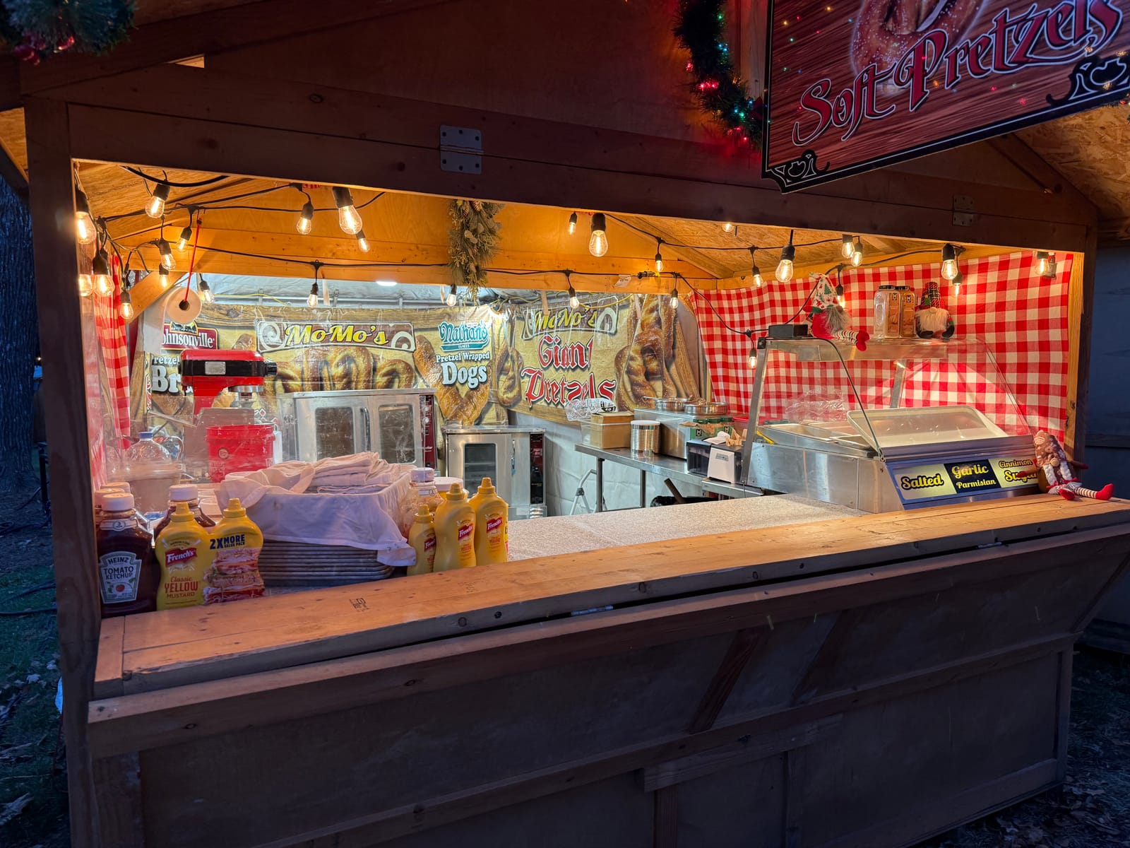 Welcoming scene at Momo's Pretzels market booth